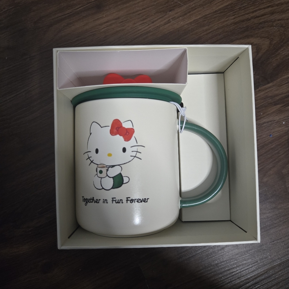 Hello Kitty Cream Mug with Green Handle
